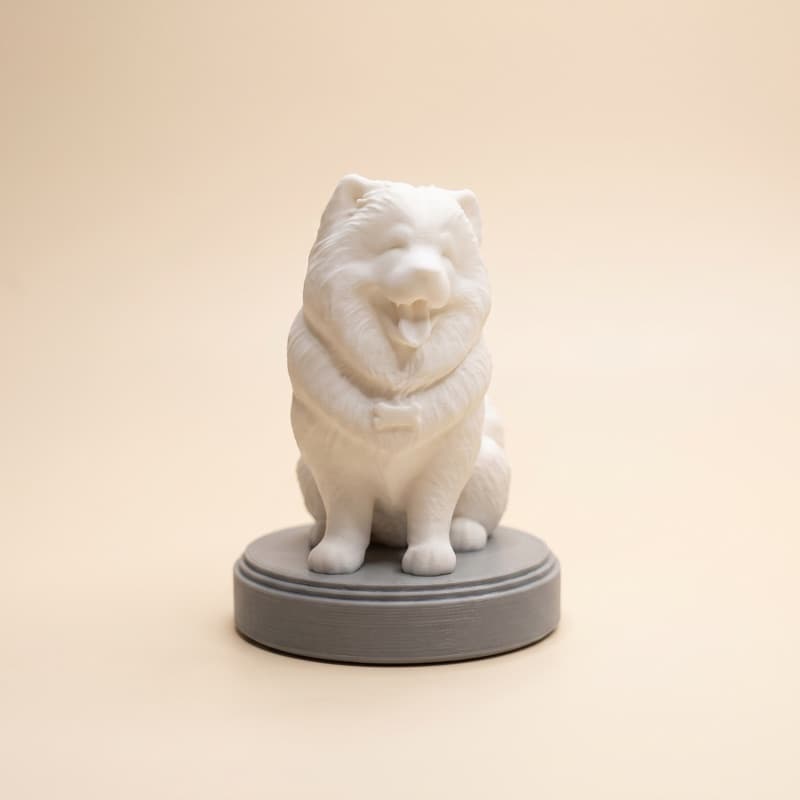 Réplica 3D de un perro peludo sin pintar, tal como llega en el kit